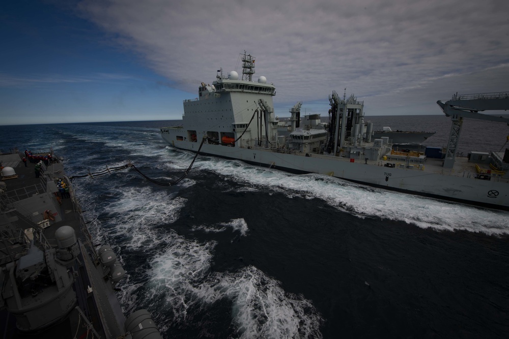 USS Thomas Hudner (DDG 116) Participates in Replenishment-at-Sea with Royal Canadian Ship MV Asterix and Royal Canadian Navy Halifax-class frigate HMCS Ville de Québec (FFH 332) During Operation Nanook