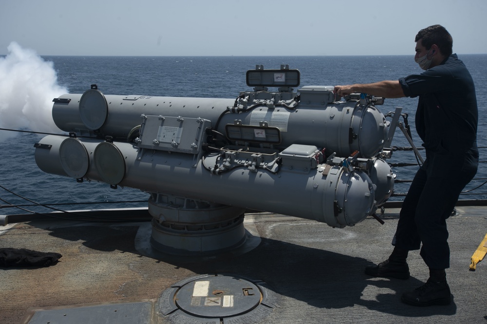 USS Ralph Johnson Conducts Torpedo Tube Maintenance