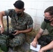 U.S. Air Force and Marine Corps servicemen conduct a digital communication exercise