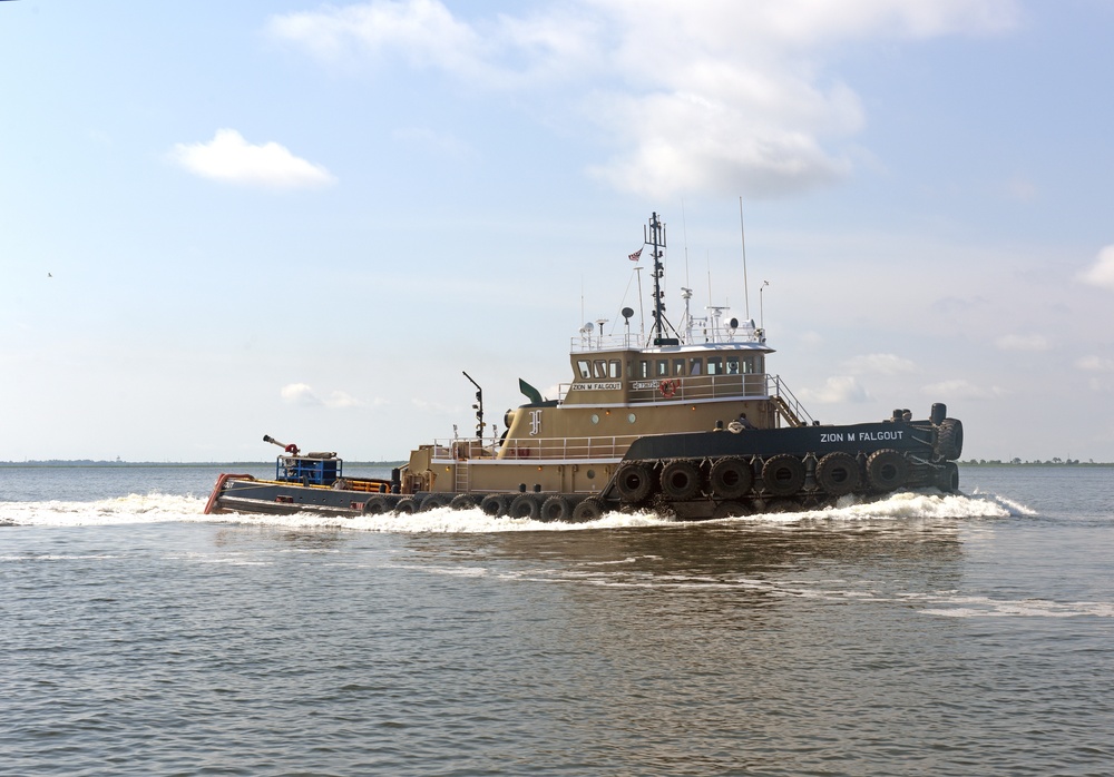 The Tug ZION transits during a fire drill