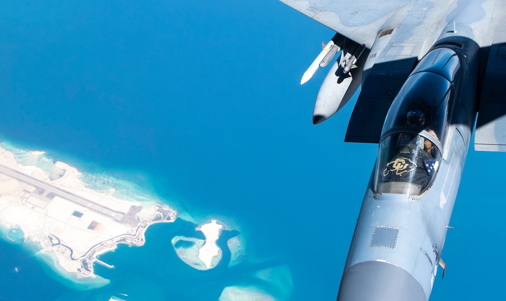 F-15Cs fly over the Arabian Gulf