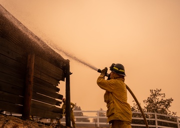Travis firefighters help community battle Solano wildfires