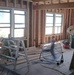 Army electricians work on building renovation