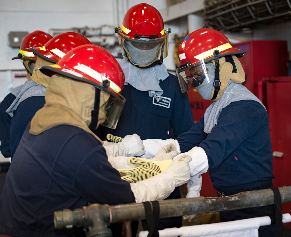 USS Carl Vinson (CVN 70) Sailors Participate In Pipe Patching Drill