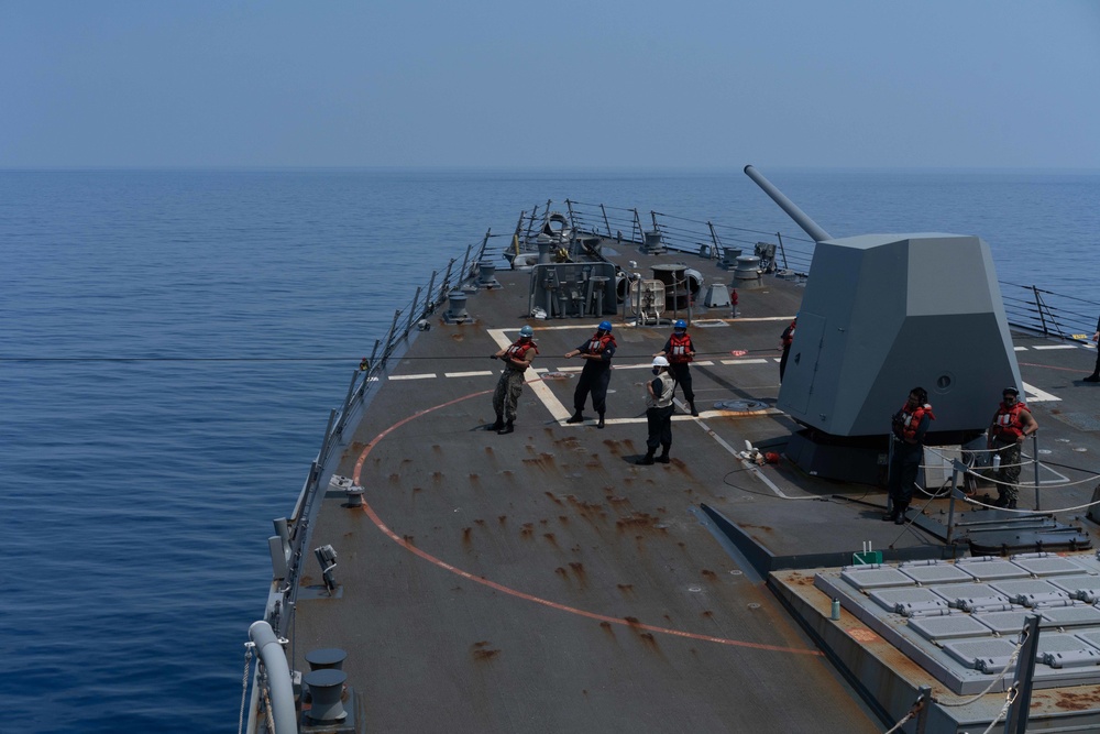 USS HALSEY CONDUCTS A REPLENISHMENT-AT-SEA