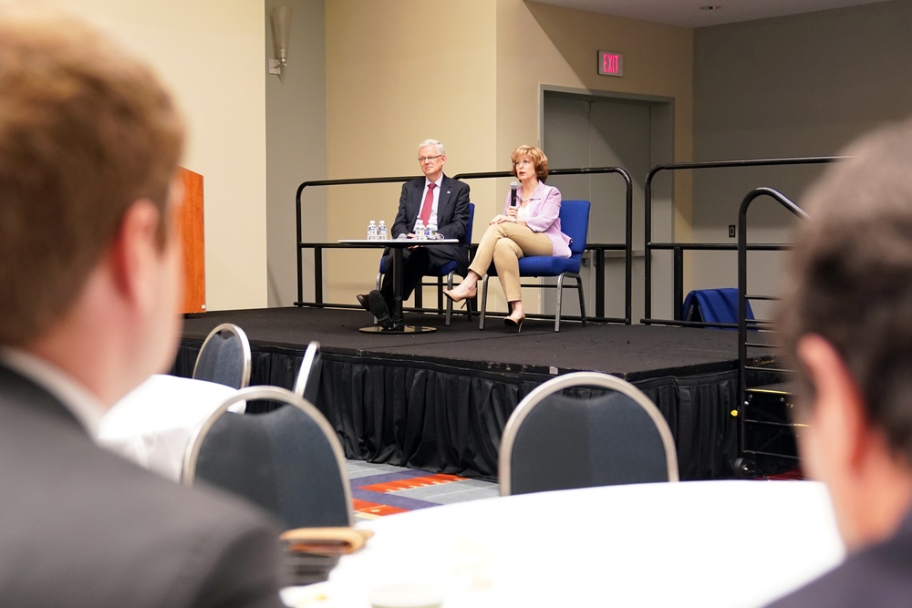 DAAID Bonnie Glick sits in on a fireside chat at InterAction