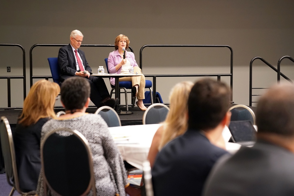 DAAID Bonnie Glick sits in on a fireside chat at InterAction