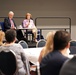 DAAID Bonnie Glick sits in on a fireside chat at InterAction