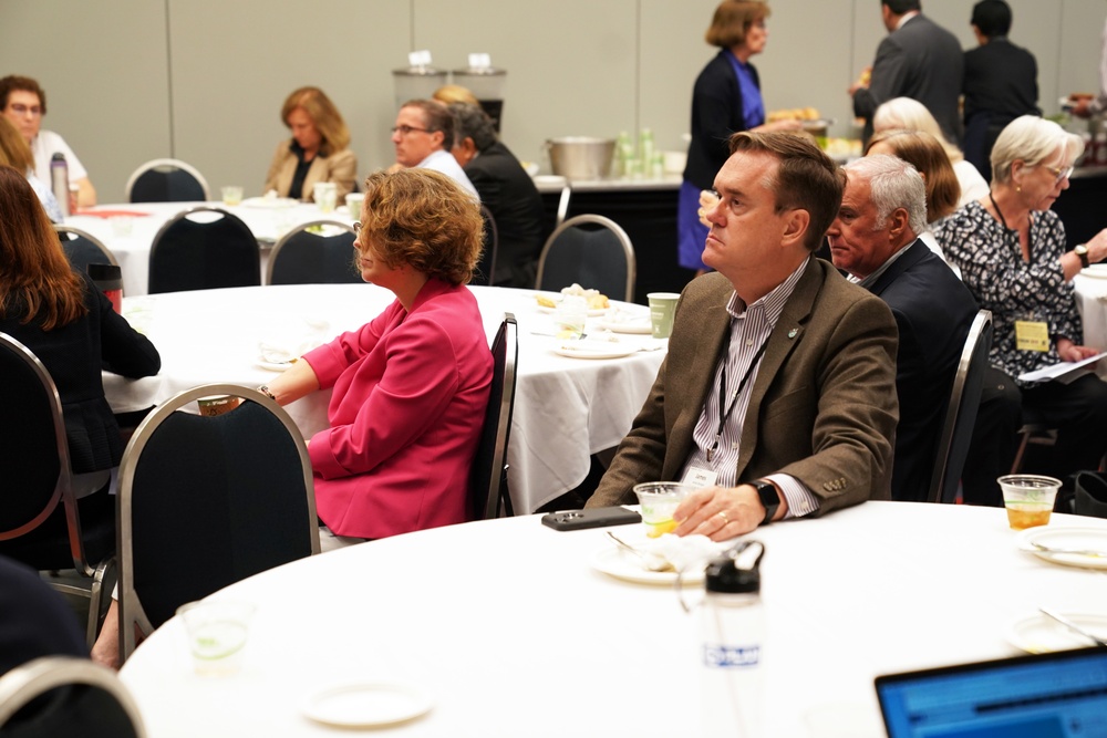 DAAID Bonnie Glick sits in on a fireside chat at InterAction