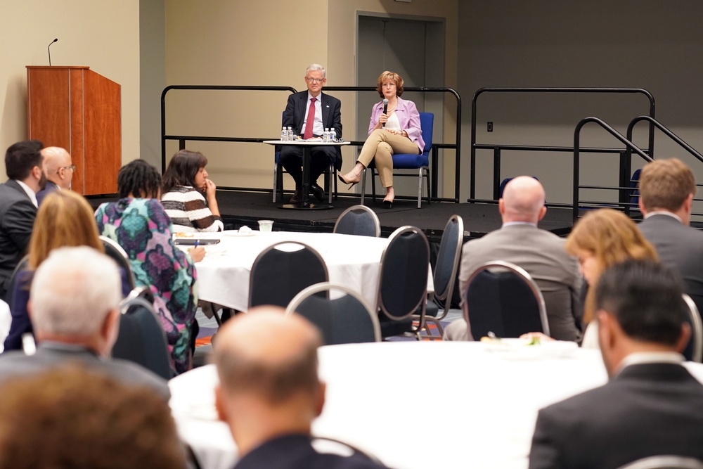 DAAID Bonnie Glick sits in on a fireside chat at InterAction