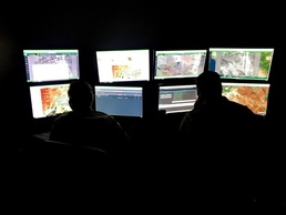 195th Wing Airmen cut through the smoke