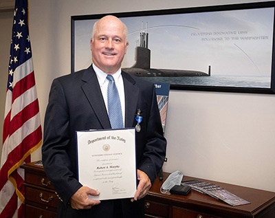 Retired NUWC Division Newport employee receives Superior Civilian Service Award