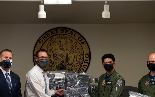 428TH FS supports local schools amidst COVID-19, distributes face coverings