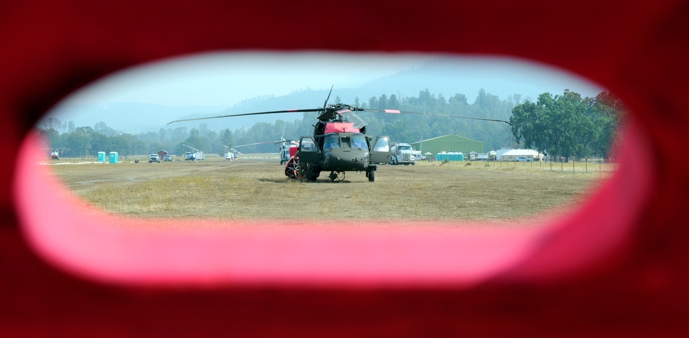 Cal Guard Soldiers work with CALFIRE to battle the LNU Lightning Complex fire