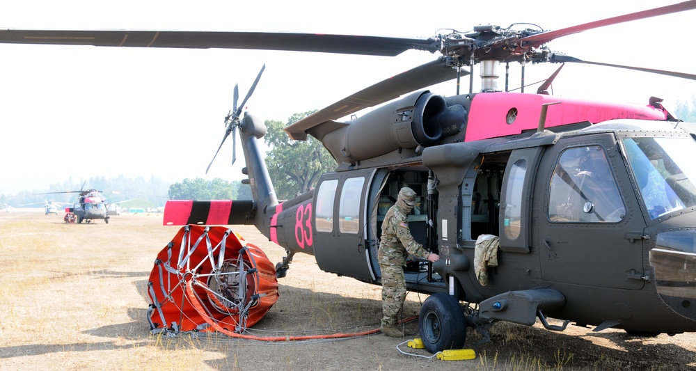 Cal Guard Soldiers work with CALFIRE to battle the LNU Lightning Complex fire