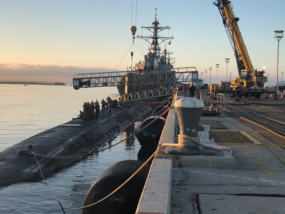 USS John Warner (SSN 785) conducted a brief stop for personnel