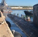 USS John Warner (SSN 785) conducted a brief stop for personnel