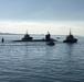 USS John Warner (SSN 785) conducted a brief stop for personnel