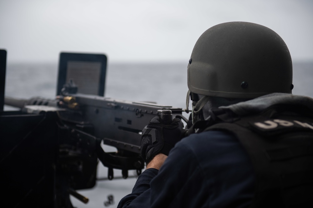 USS Princeton Sailors participate in a . 50 Cal Gun Shoot