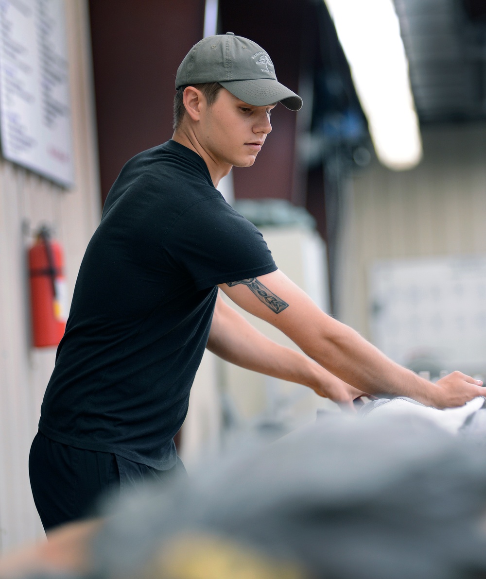 USAJFKSWCS Riggers Repack Reserve Parachutes