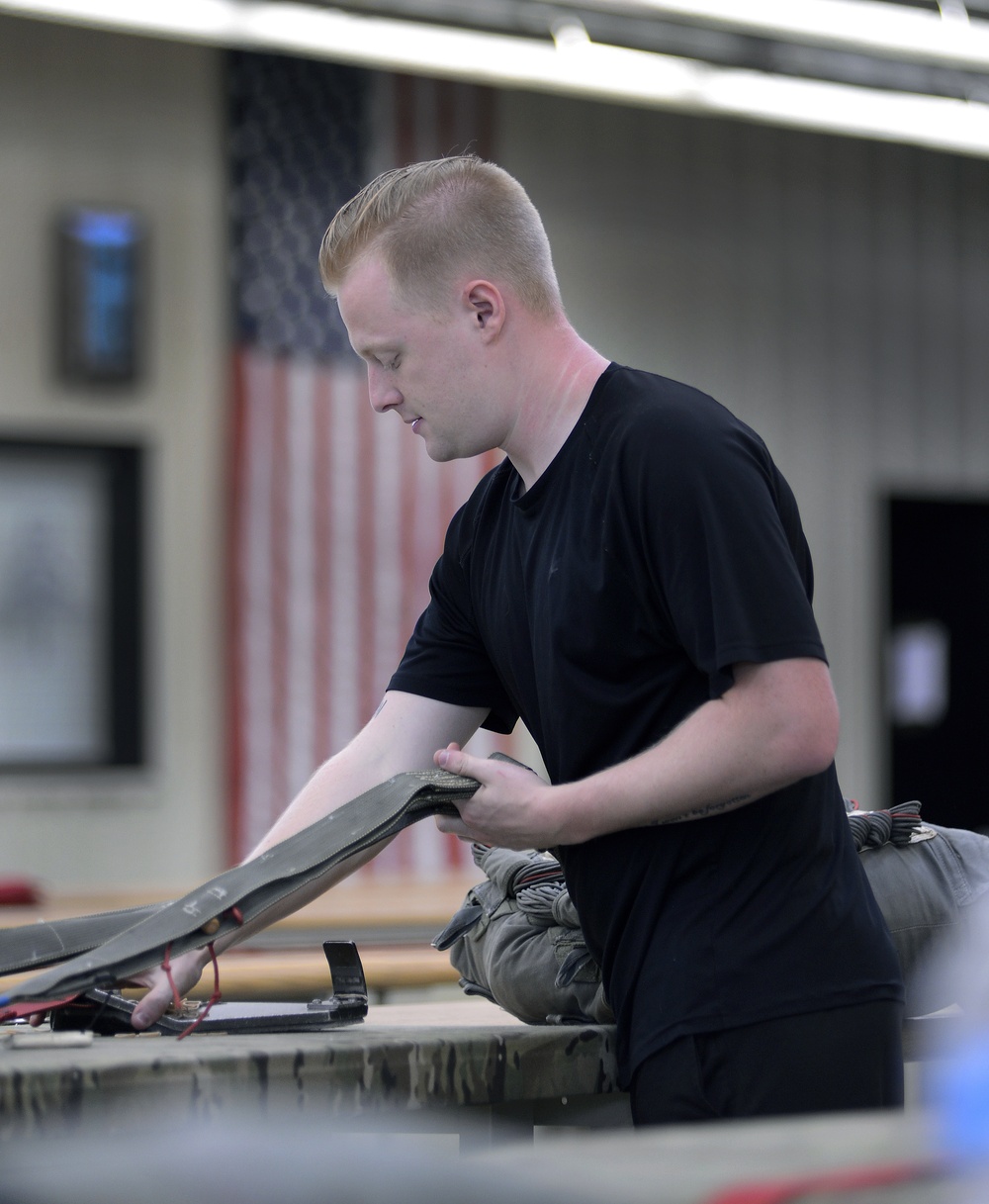 USAJFKSWCS Riggers Repack Parachutes
