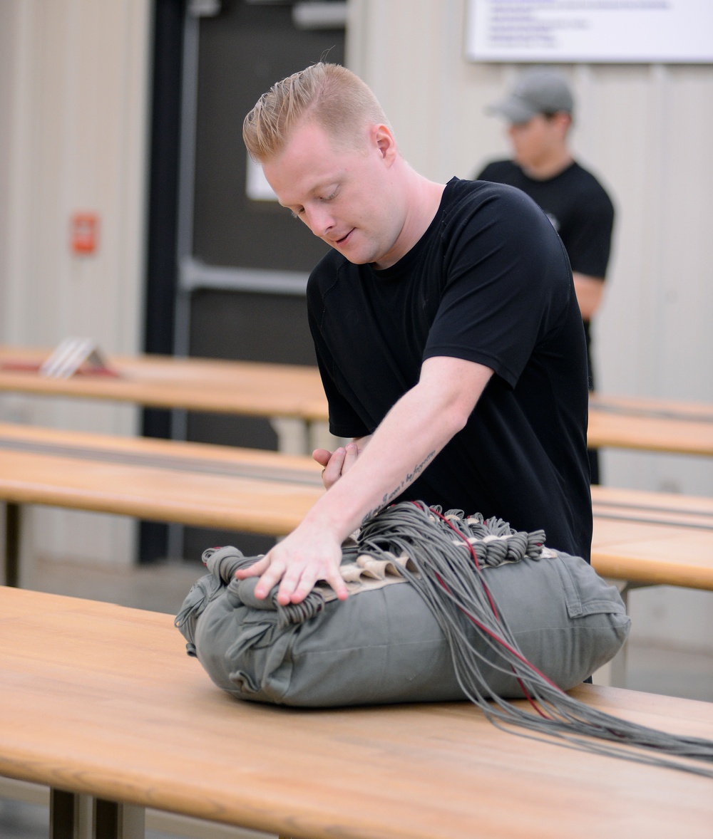 USAJFKSWCS Riggers Repack Parachutes