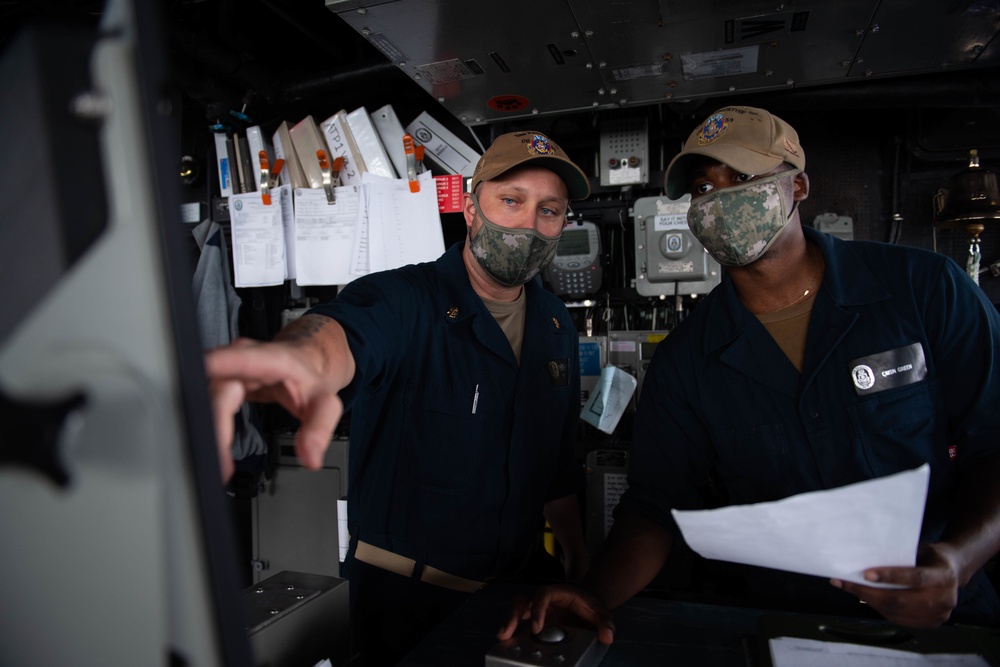 USS Princeton Sailors stand watch in the Pilot House