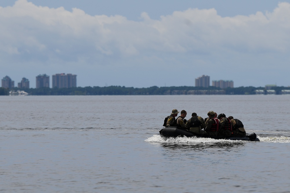 Special Tactics operators conduct static-line jump training