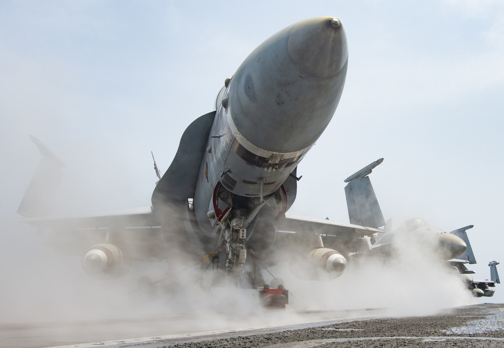 F/A-18C Hornet, From The Death Rattlers of Marine Fighter Attack Squadron (VMFA) 323, Rests On Flight Deck Aboard Aircraft Carrier USS Nimitz CVN 68