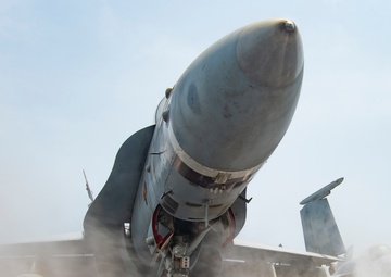 F/A-18C Hornet, From The Death Rattlers of Marine Fighter Attack Squadron (VMFA) 323, Rests On Flight Deck Aboard Aircraft Carrier USS Nimitz CVN 68