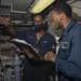 Machinist's Mates Check Liquid Nitrogen Readings Aboard Aircraft Carrier USS Nimitz CVN 68