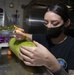 Culinary Specialist Prepares Squash Decoration Aboard Aircraft Carrier USS Nimitz CVN 68