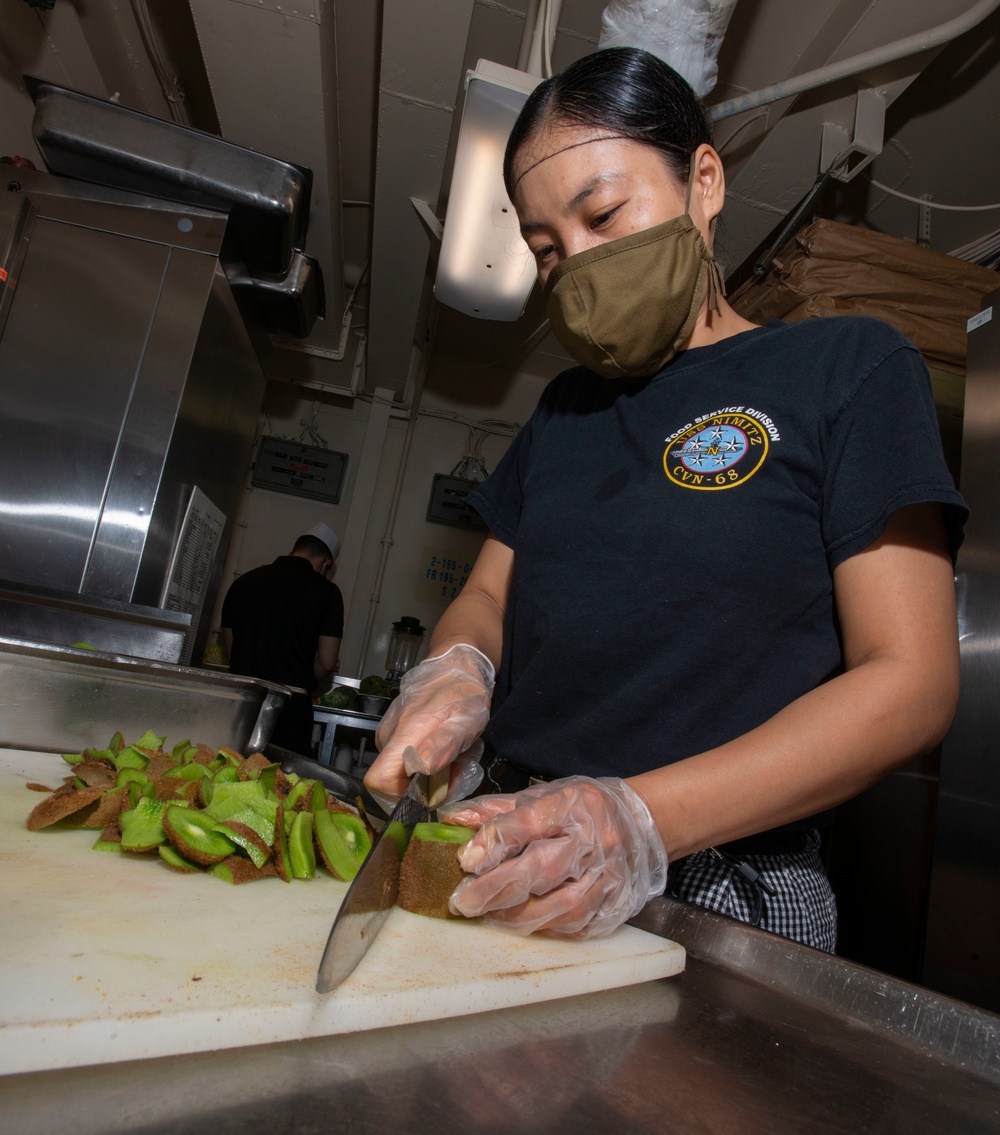 Culinary Specialist Prepares Kiwis Aboard Aircraft Carrier USS Nimitz CVN 68