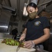 Culinary Specialist Prepares Kiwis Aboard Aircraft Carrier USS Nimitz CVN 68