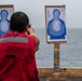 A Sailor participates in a small arms live fire exercise aboard the aircraft carrier USS Nimitz