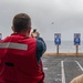 command master chief of the aircraft carrier USS Nimitz (CVN 68), from Tucson, Ariz., participates in a small arms live fire exercise aboard Nimitz