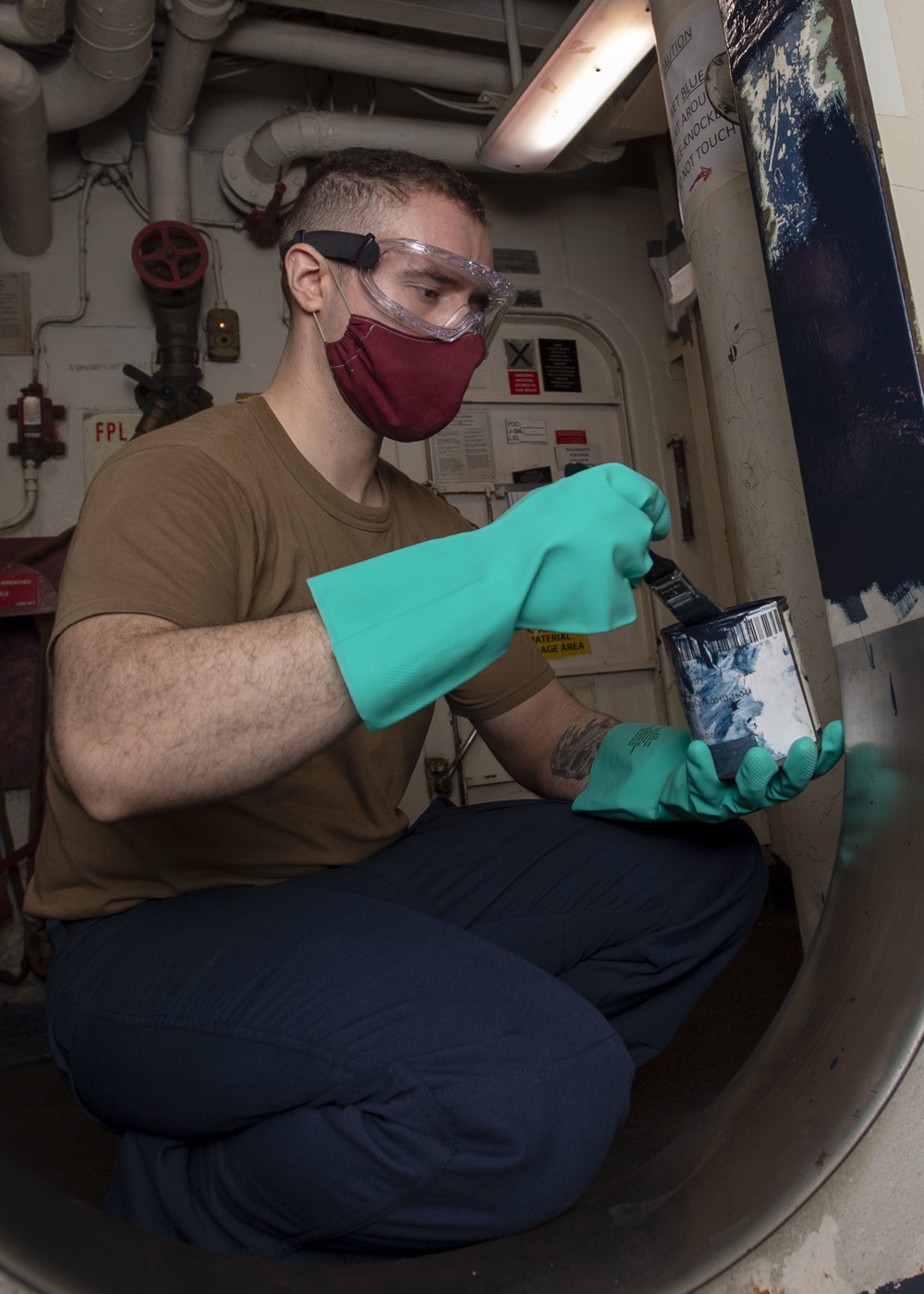 Sailor Paints Knee Knocker To Fantail