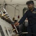 Nimitz CSG Sailor Processes Ship’s Store Transaction