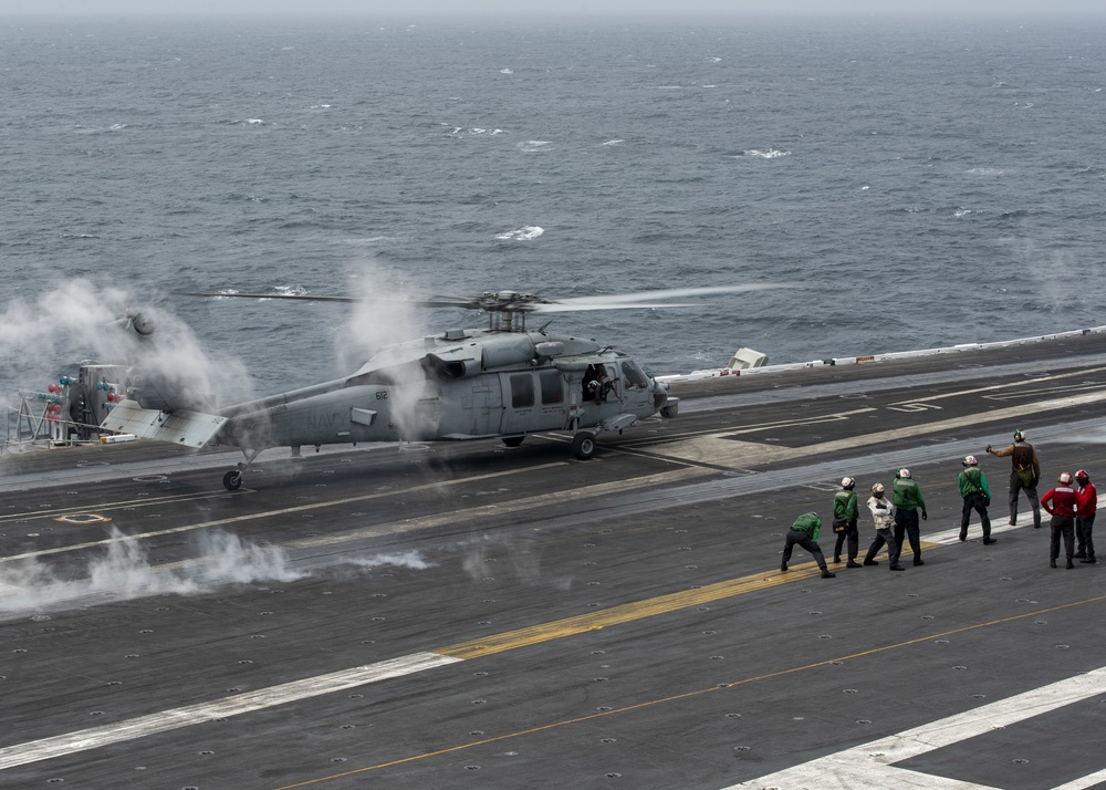 Helicopter Takes Off Of Flight Deck