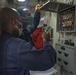 Ralph Johnson Sailors Inspect Power Panel