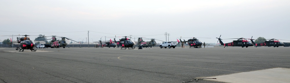 Cal Guard Soldiers work with CalFire firefighters to battle the LNU Lightning Complex fire