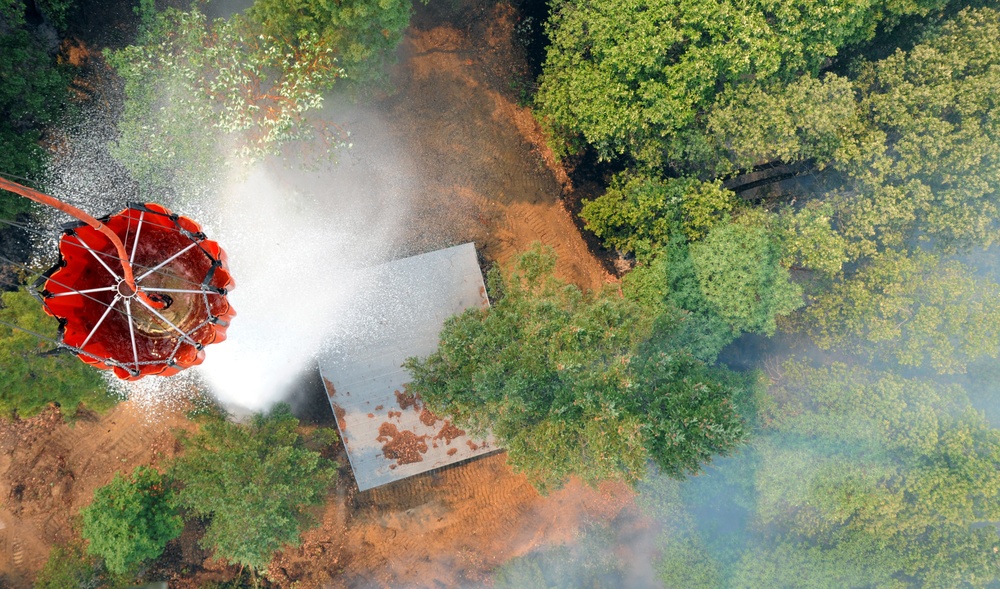 Cal Guard Soldiers work with CalFire firefighters to battle the LNU Lightning Complex fire