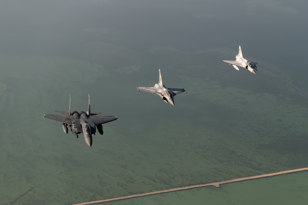 A U.S. Air Force KC-135 Stratotanker refuels F-15E Strike Eagle