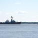 USS Charles F. Adams is towed through the Delaware River