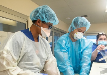 Air Force medical providers treat patients in Los Angeles ICU