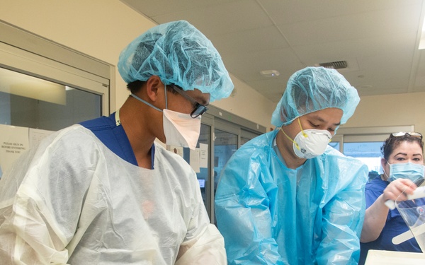 Air Force medical providers treat patients in Los Angeles ICU