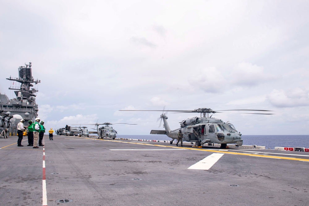USS America (LHA 6) And 31st Marine Expeditionary Unit Conduct Flight Ops and VBSS Exercise