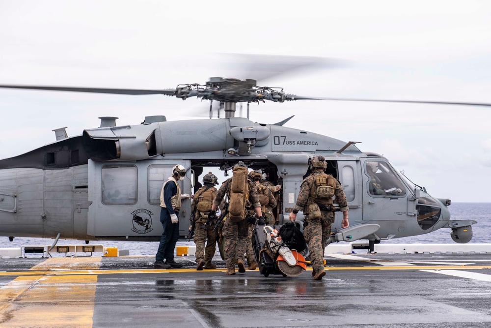 USS America (LHA 6) And 31st Marine Expeditionary Unit Conduct Flight Ops and VBSS Exercise