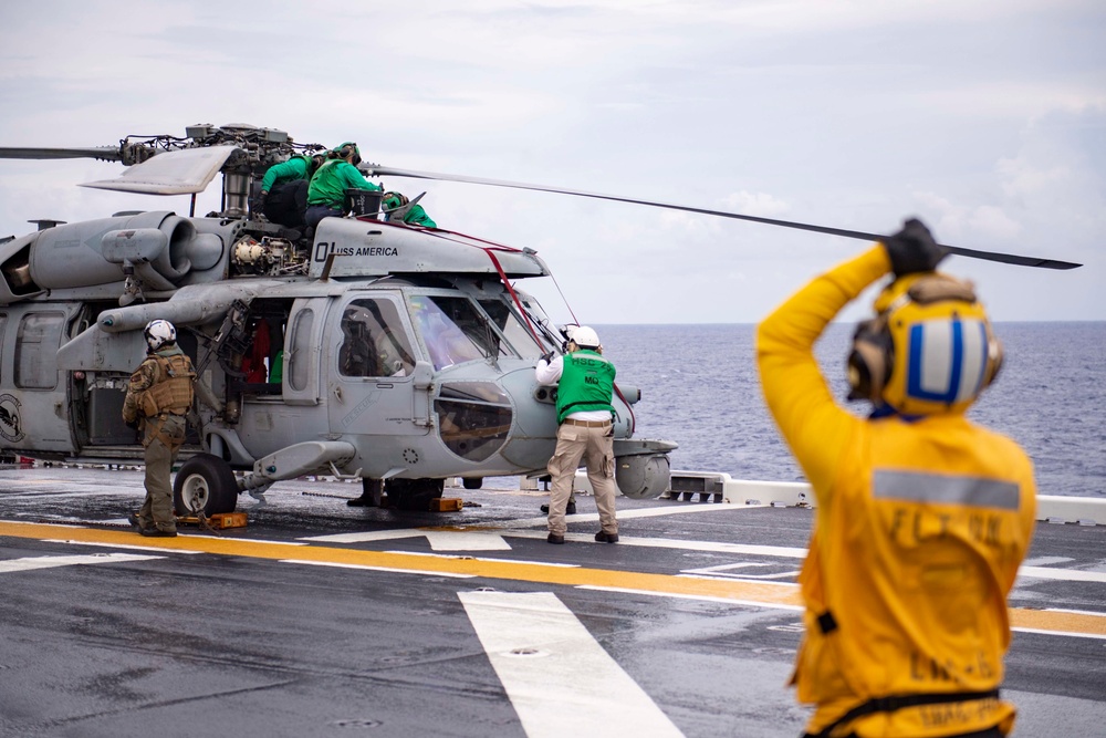 USS America (LHA 6) And 31st Marine Expeditionary Unit Conduct Flight Ops and VBSS Exercise