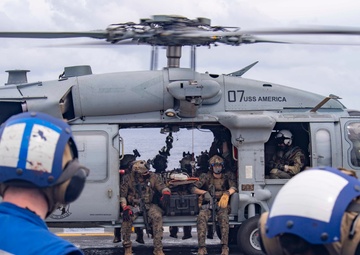 USS America (LHA 6) And 31st Marine Expeditionary Unit Conduct Flight Ops and VBSS Exercise